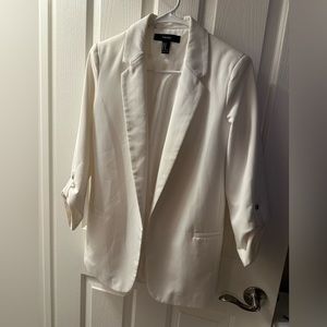 White pocketed blazer